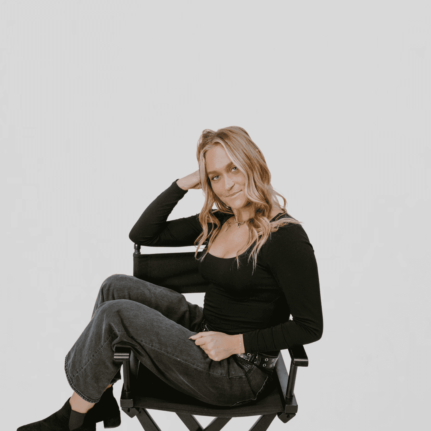 Portrait of Abby, a professional stylist at The Gloss Society, showcasing their expertise and style.