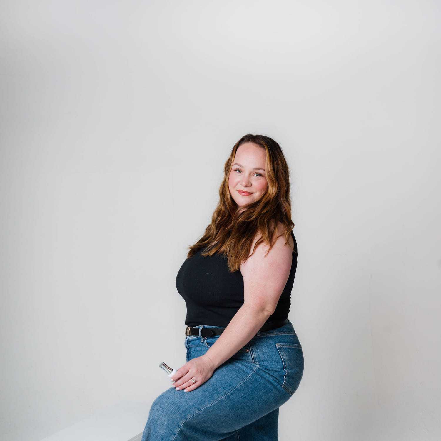 Portrait of Samantha, a professional stylist at The Gloss Society, showcasing their expertise and style.