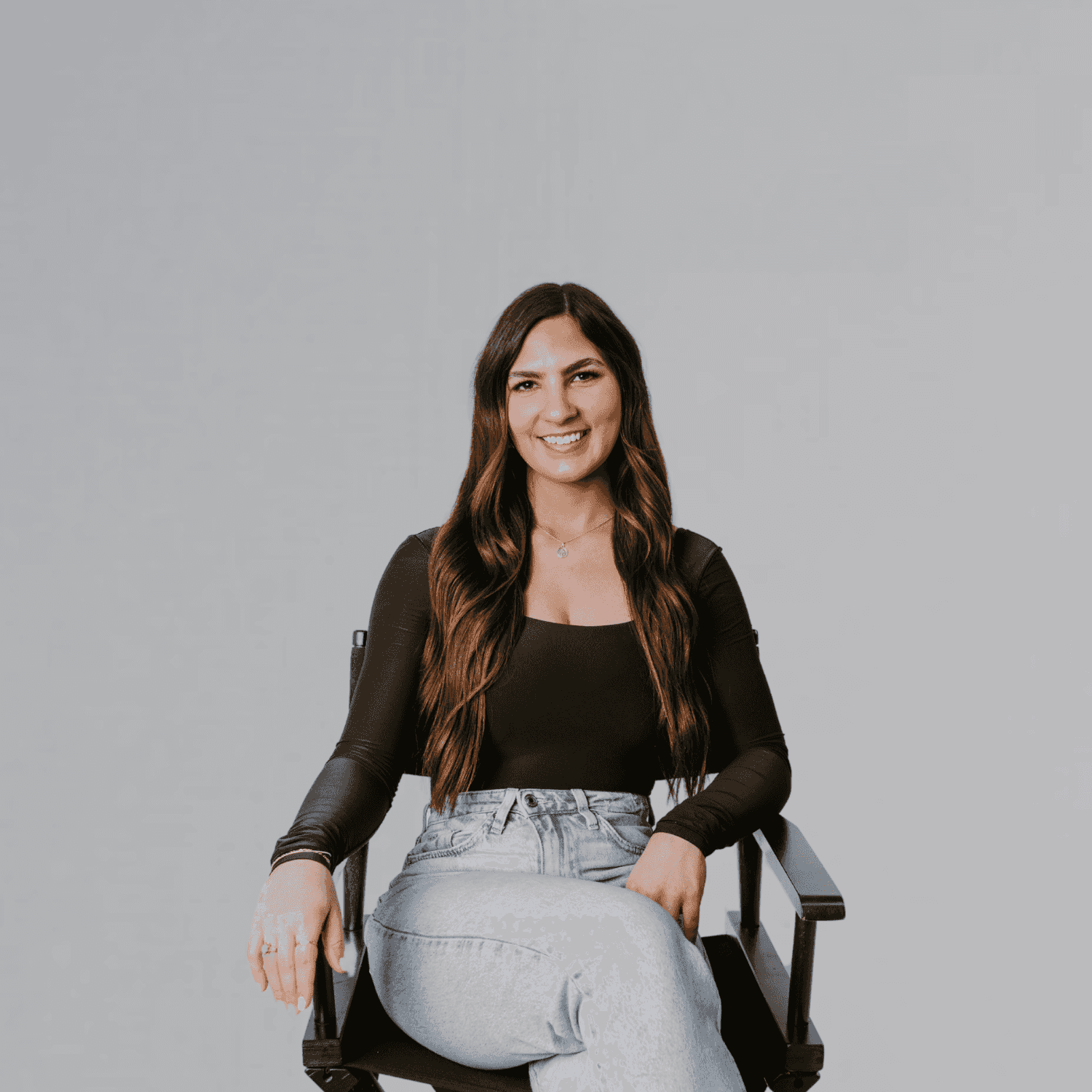 Portrait of Emily, a professional stylist at The Gloss Society, showcasing their expertise and style.