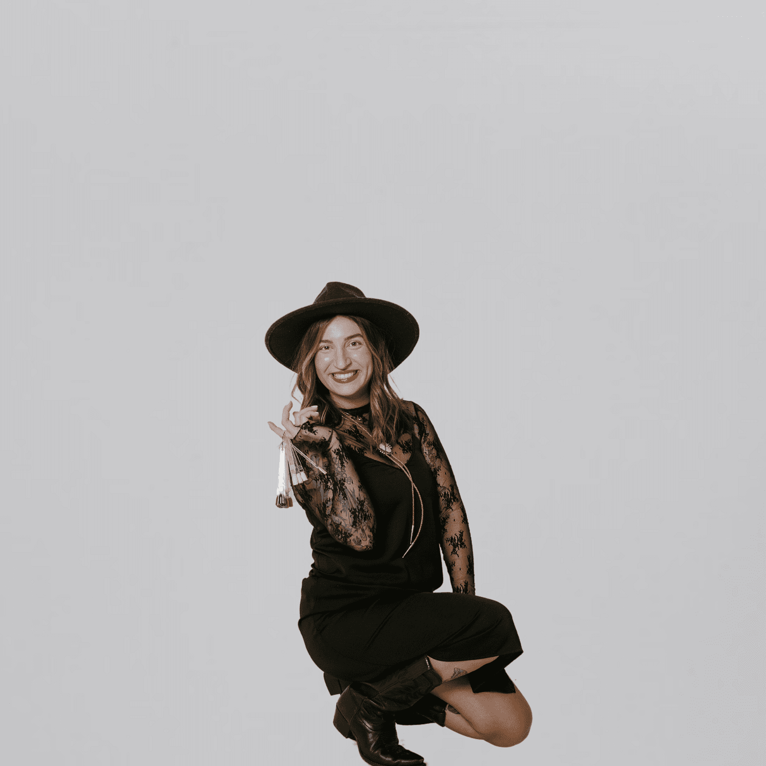 Portrait of Alexa, a professional stylist at The Gloss Society, showcasing their expertise and style.