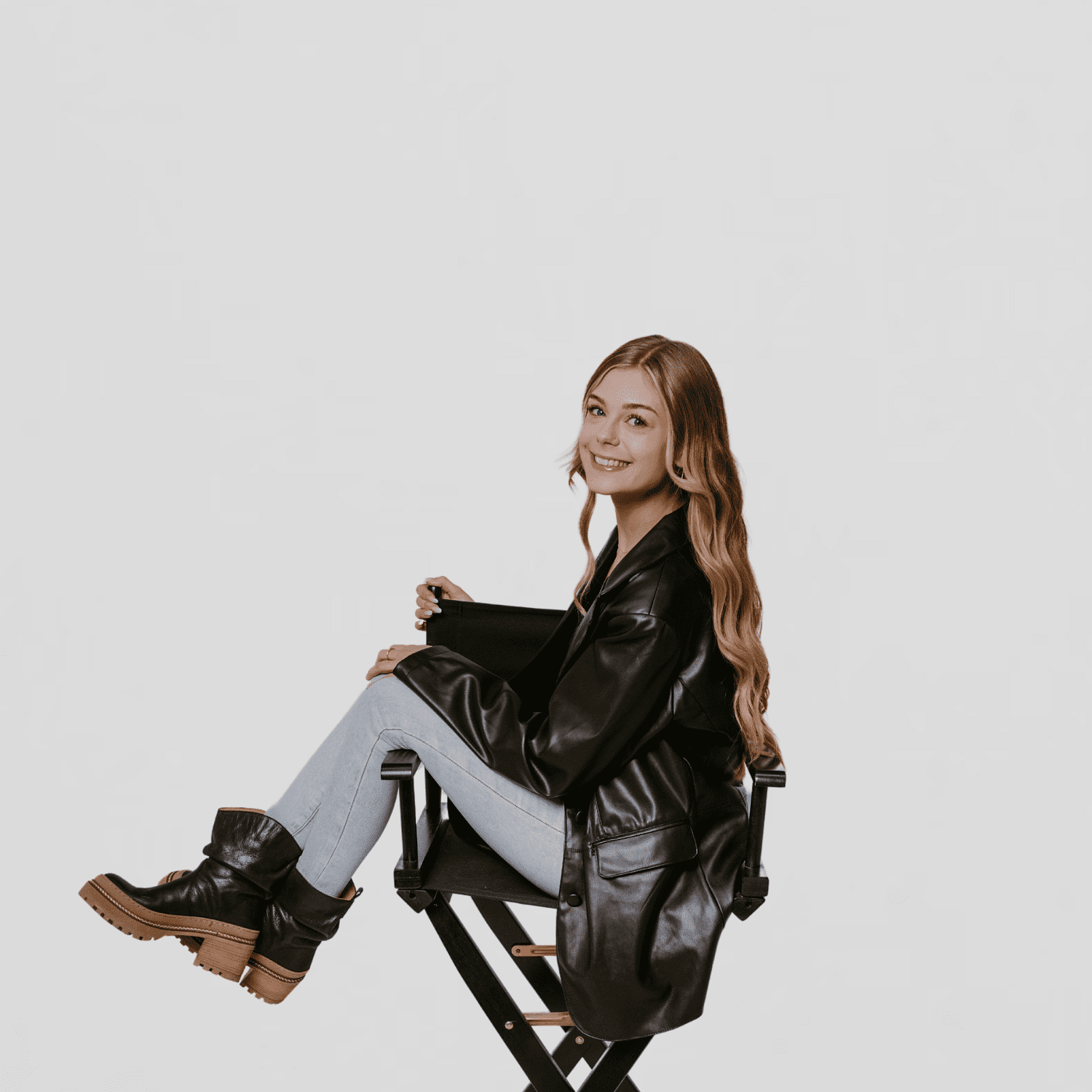 Portrait of Holly, a professional stylist at The Gloss Society, showcasing their expertise and style.