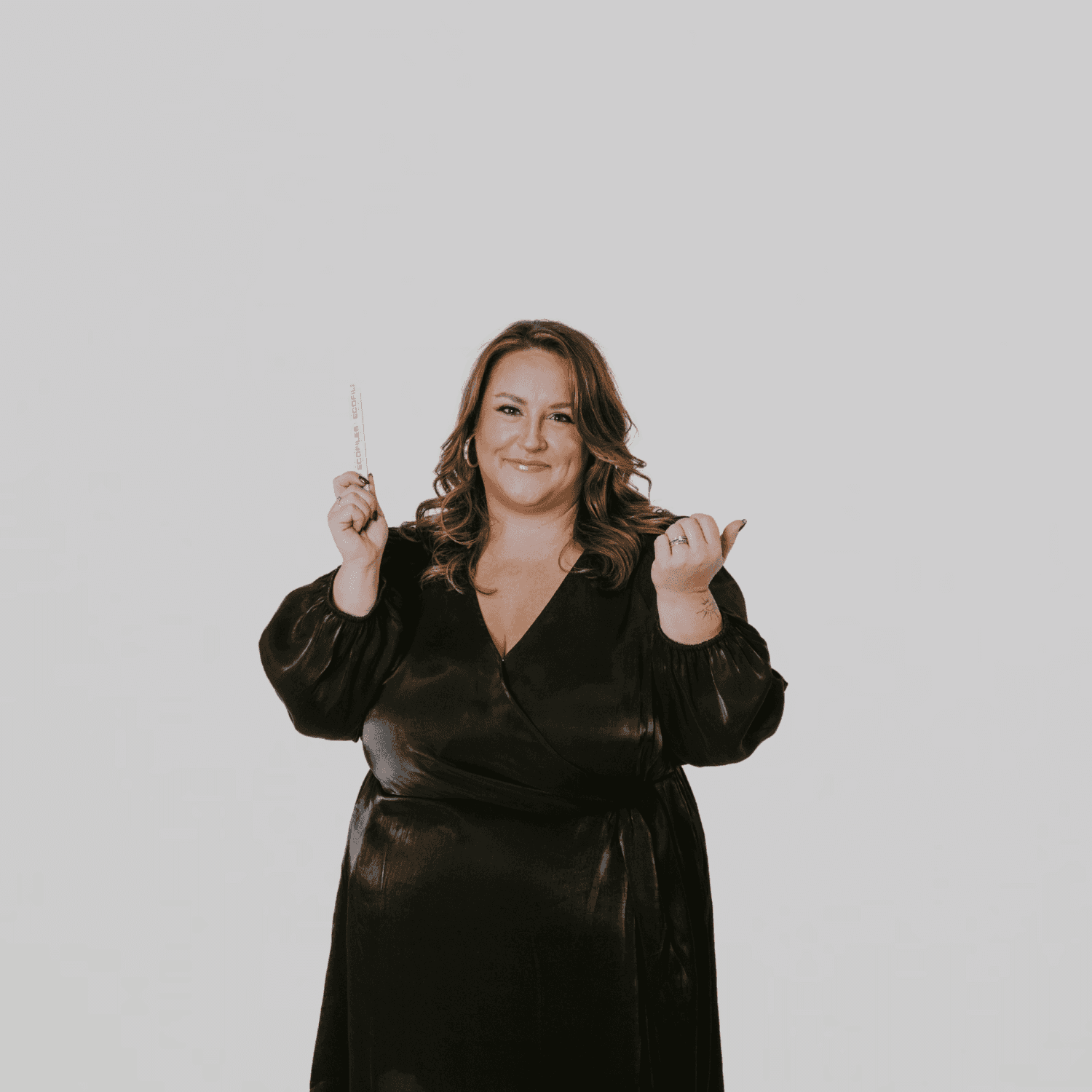 Portrait of Shane, a professional stylist at The Gloss Society, showcasing their expertise and style.