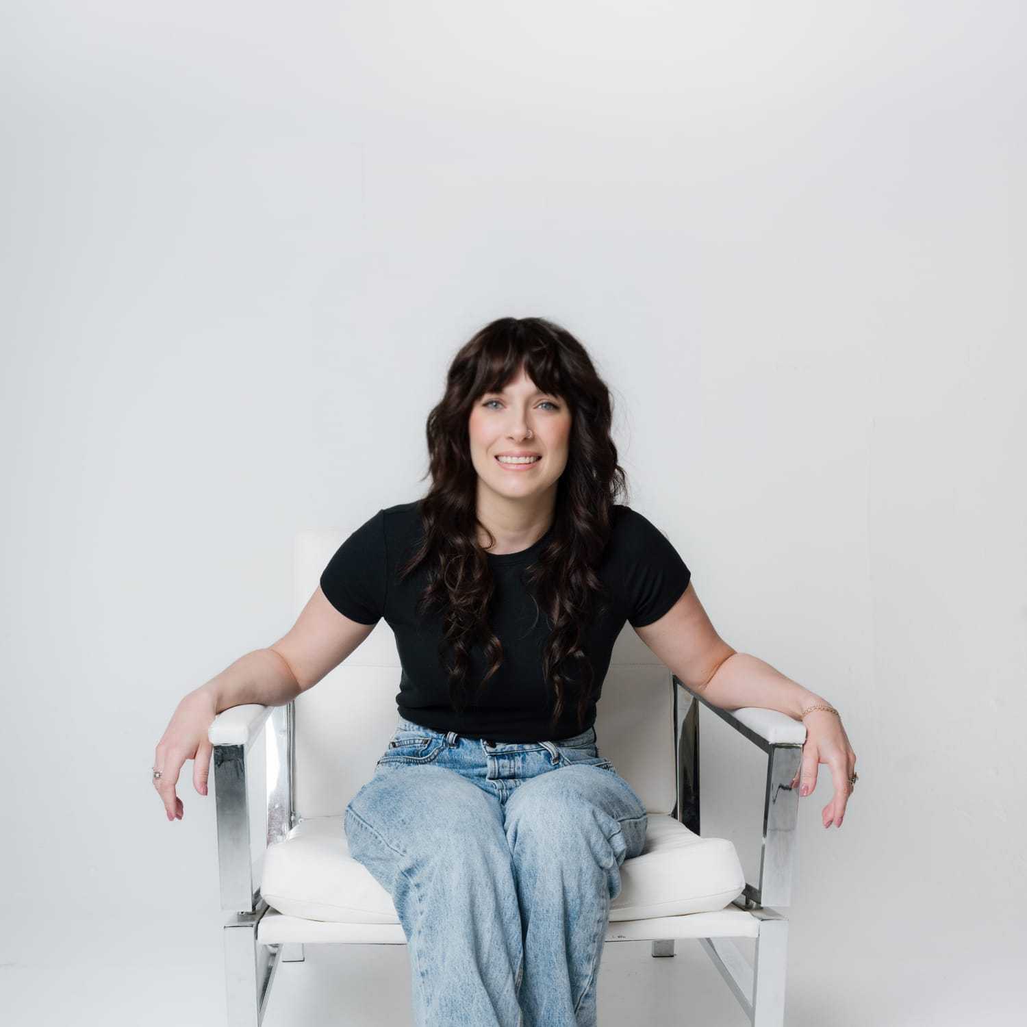 Portrait of Jenna, a professional stylist at The Gloss Society, showcasing their expertise and style.