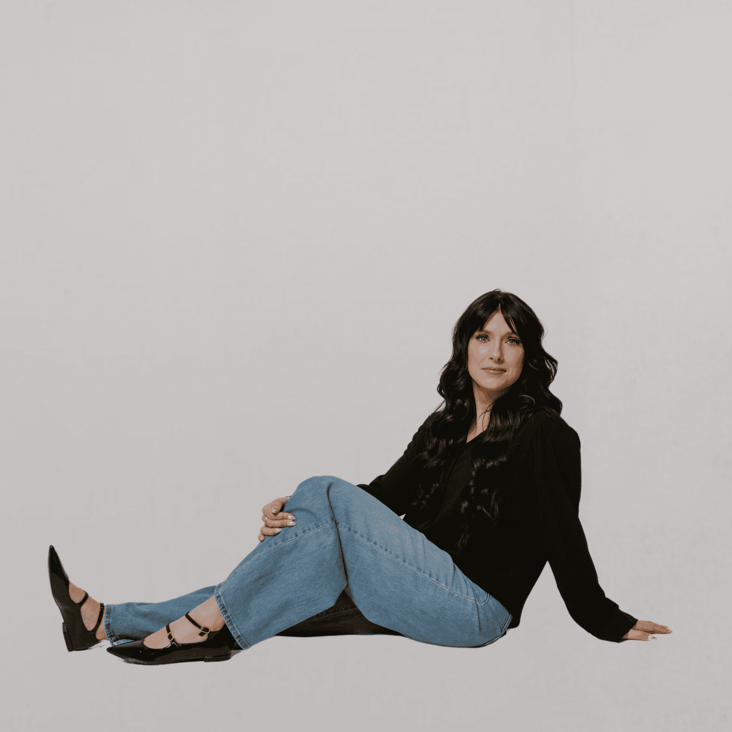 Portrait of Jenna, a professional stylist at The Gloss Society, showcasing their expertise and style.